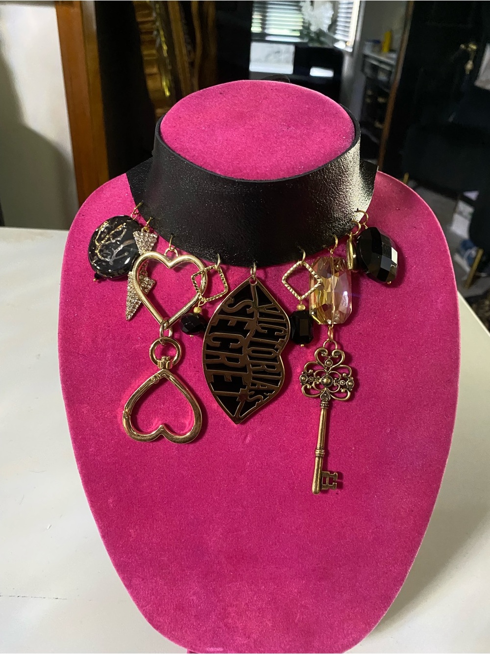 Victoria's Secret Gold Charm Necklace with Pink and Black Accents